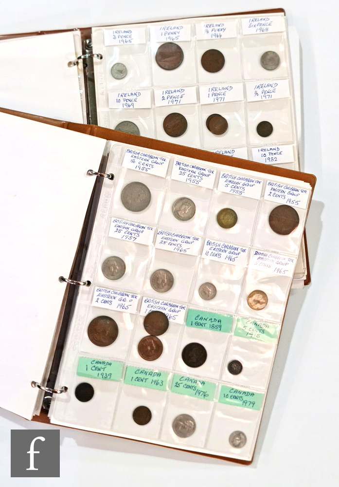 A world coin collection contained in two albums to include Germany, Austria, Belgium, France,