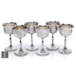 A set of six hallmarked silver goblets, total weight 27.5oz, heights 14cm, circular stepped foot
