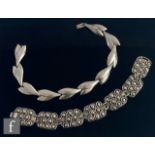 Two post war silver bracelets, the first attributed to Henning Koppel formed from ten elliptical