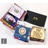 A collection of various Elizabeth II cased single and part set royal event commemorative issues,