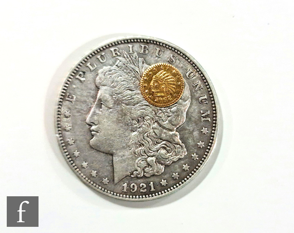 An American 1921 Morgan dollar with a Californian 1852 fractional gold coin. (2)