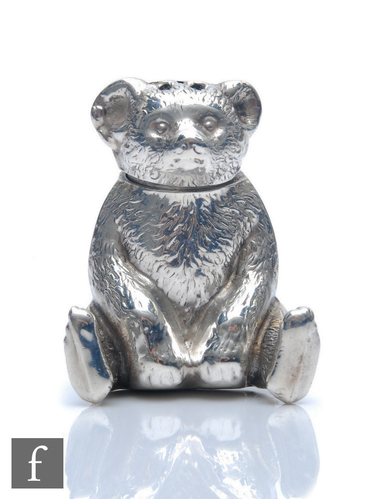 An Edwardian novelty pepper pot  modelled as a seated Teddy bear, weight 10g, height 3.5cm,