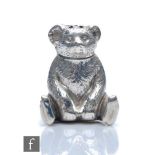 An Edwardian novelty pepper pot  modelled as a seated Teddy bear, weight 10g, height 3.5cm,