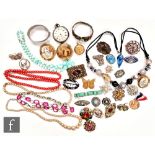 A parcel lot of assorted costume and other jewellery to include beads, brooches, bangles, a cameo
