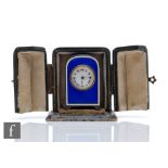 An early 20th Century French silver miniature boudoir clock, Roman numerals to a white enamelled