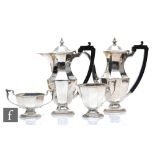 A hallmarked silver pedestal, octagonal shaped, four piece cafe au lait set, pots terminating in