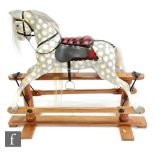 An early 20th Century Lines Brothers Ltd Sportiboy SP3 rocking horse, fully restored, the pine