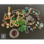 A small parcel lot of assorted silver and other jewellery to include earrings, pendants, a Raymond