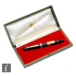 A Mont Blanc Meisterstuck No, 149 fountain pen, black lacquer with gold plated clip and mounts,