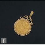 An Elizabeth II half sovereign loose mounted to a 9ct pendant mount, total weight 6.2g, coin dated