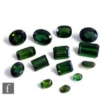 Fourteen cut and polished loose green tourmaline stones to include emerald and faceted oval cut