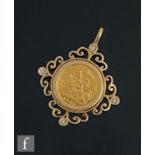 An Elizabeth II half sovereign dated 1982, loose mounted to a 9ct mount detailed with four diamonds,