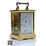 A 20th Century French brass repeater carriage clock, push button, in contemporary style case,