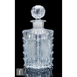 A 19th Century Baccarat glass decanter, circa 1840, of square section, moule in plien with