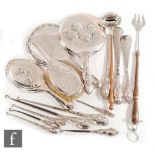 A small parcel lot of assorted hallmarked silver items to include a modern toasting fork and toddy