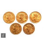 Five Swiss twenty franc coins, all dated 1935. (5)