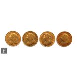 Four Victoria veil head full sovereigns dated 1894 x 2 and 1901 x 2. (4)