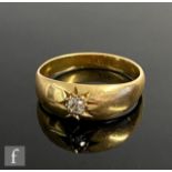 An early 20th Century 18ct single stone diamond ring, gypsy set stone to a boat shaped head,