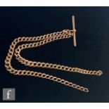 An early 20th Century 9ct curb link, double Albert chain, weight 35g, length 40cm with central T