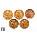 Five Swiss twenty franc coins, all dated 1935. (5)