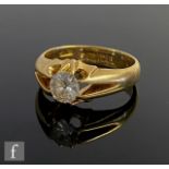 An 18ct hallmarked diamond solitaire ring, old cut claw set stone, weight approximately 0.85ct,
