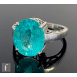 An 18ct white gold single stone, claw set paraiba tourmaline, weight approximately 6.78ct, to