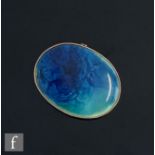 A 9ct hallmarked later mounted oval Ruskin brooch in a navy and pale blue glaze, weight 8.9g, length