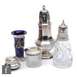 Five items of hallmarked silver, two sugar castors, a hair tidy, a small vase and a trinket box,