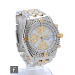 A gentleman's stainless steel and gold Breitling chronometer automatic wristwatch, gilt batons,