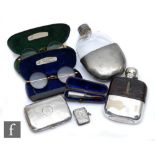 A hallmarked silver cigarette case with two silver plated hip flasks, a silver vesta case, two pairs
