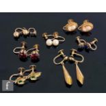 Eight pairs of 9ct stone set and plain earrings to include cameo, garnet and emerald examples, total