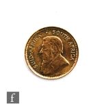 A quarter Krugerrand dated 1980.