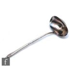 A Danish silver ornamental pattern sauce ladle with beaten bowl, length 14cm, import mark for