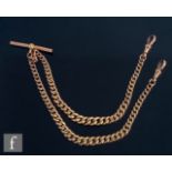 A 9ct rose gold graduated double Albert chain, weight 16.2g, length 37cm, terminating in T bar and