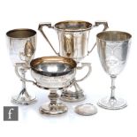 Five items of hallmarked silver, a medallion, two goblets, two trophy cups and one cup, weight 21oz,