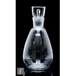 A 1950s Steuben glass decanter designed by George Thompson, of ovoid form with tapering drum form