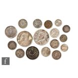 A Chinese silver dollar (fat man) 26.8g, a 1934 Chinese junk dollar 26.7g and various other