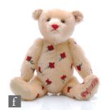 A Steiff 663017 Musical Bear Jerusalem, blond mohair with embroidered roses, limited edition 246