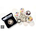 Twenty seven modern American silver one ounce enamel back dollars including a cased dollar and