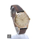 A gentleman's 9ct hallmarked Rolex manual wind wristwatch, batons to a circular cream dial, case