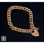 An early 20th Century 9ct rose gold open curb link bracelet with alternated chased links, weight