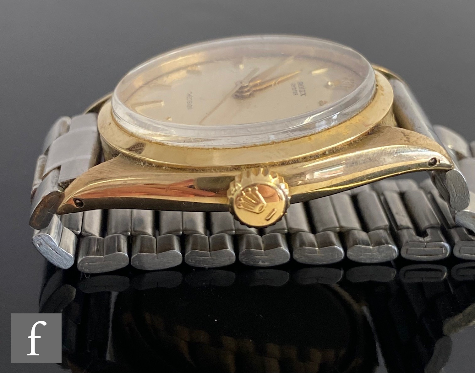 A 9ct hallmarked Rolex Oyster Precision automatic wrist watch with gilt batons to a cream dial, case - Image 5 of 8