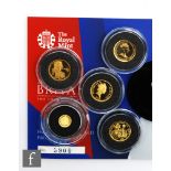 An Elizabeth II 2014 Britannia fortieth-ounce gold proof coin and four gold miniature 24ct coins for