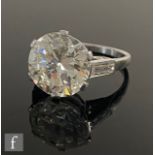 An early 20th Century platinum diamond solitaire ring, brilliant cut set stone, weight 5.65ct,
