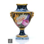 A 19th Century Chamberlain Worcester vase decorated with a hand painted cartouche panel with a spray