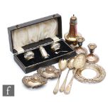 A small parcel lot of hallmarked silver items, a pair of bon bon dishes, a sugar castor, a cased