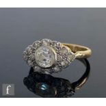 An 18ct hallmarked diamond cluster ring, central collar set stone, weight approximately 0.50ct,