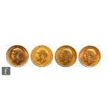 Four George V full sovereigns dated 1912, 1913, 1918 and 1923.