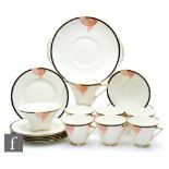 A 1930s Art Deco Royal Doulton Tango pattern part teaset comprising six cups, six saucers, six