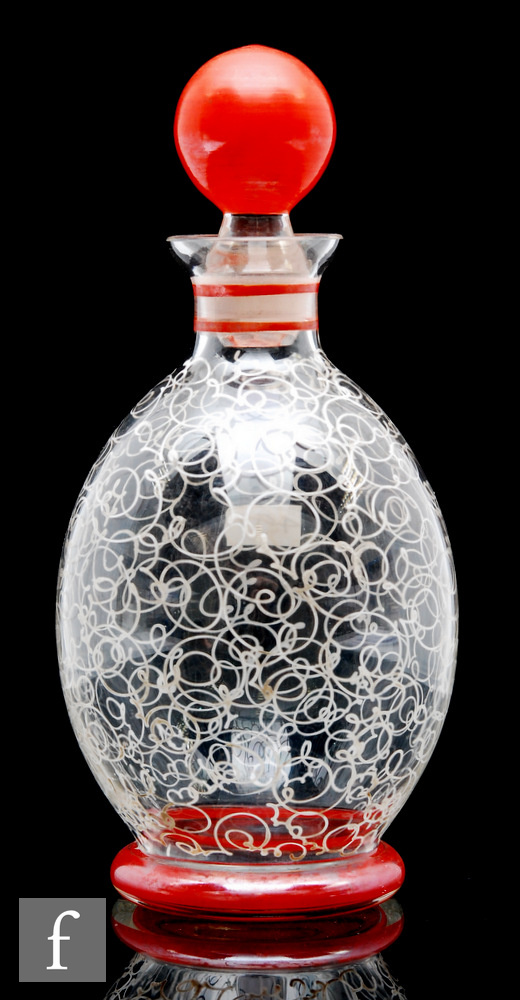 A 1960s Czechoslovakian glass liqueur decanter, of footed ovoid form, the body decorated with
